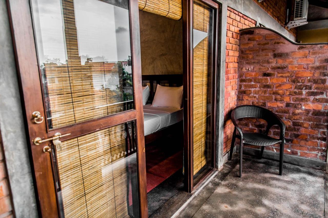 Negombo Boutique Villa Exterior foto A room at the hotel